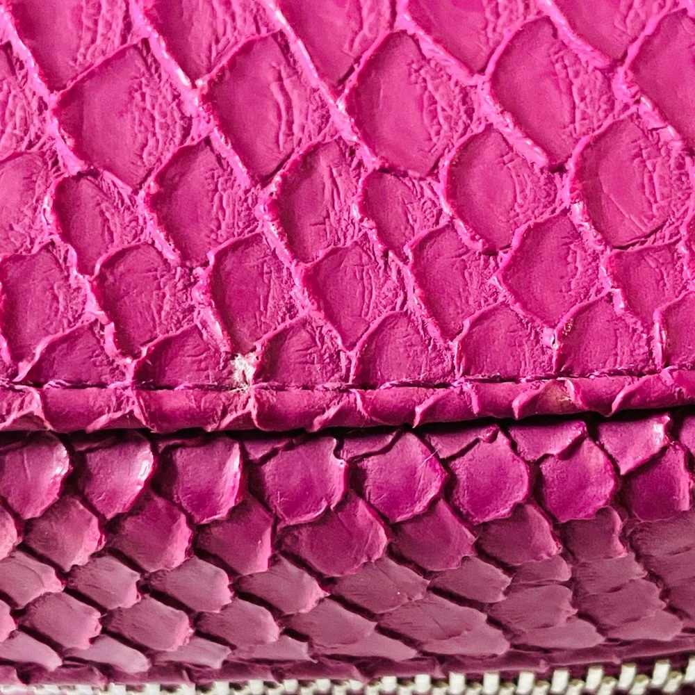 TRISH McEvoy embossed pink makeup planner